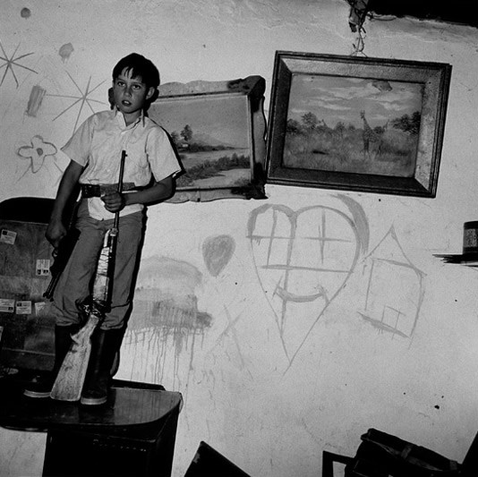 Boy with guns, Western Transvaal, 1993