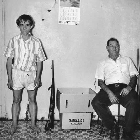 Prospectors inside house, Western Transvaal, 1987